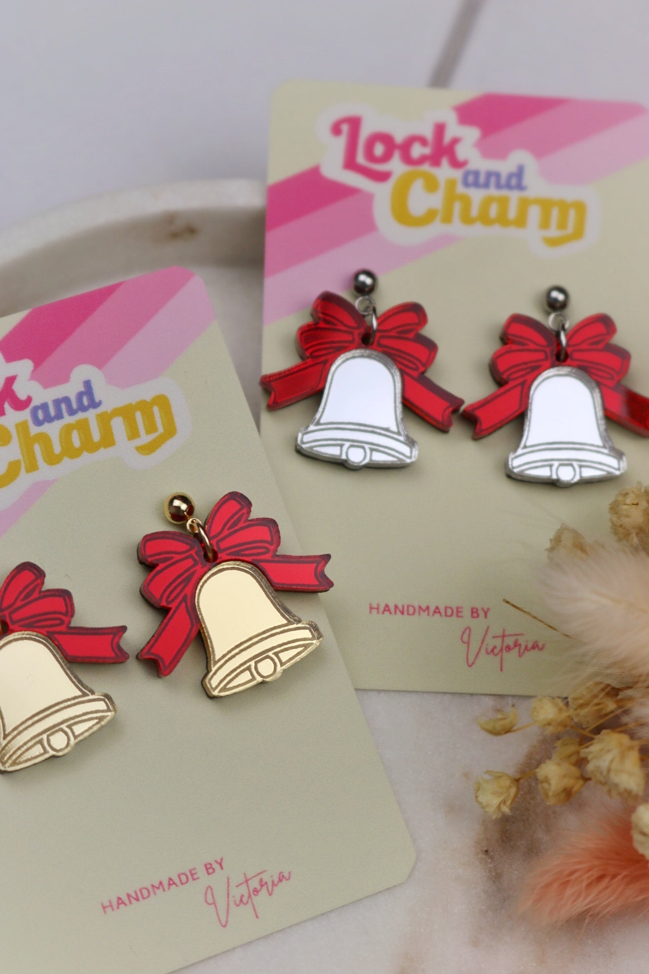 Red Ribbon Bell Acrylic Christmas Earrings