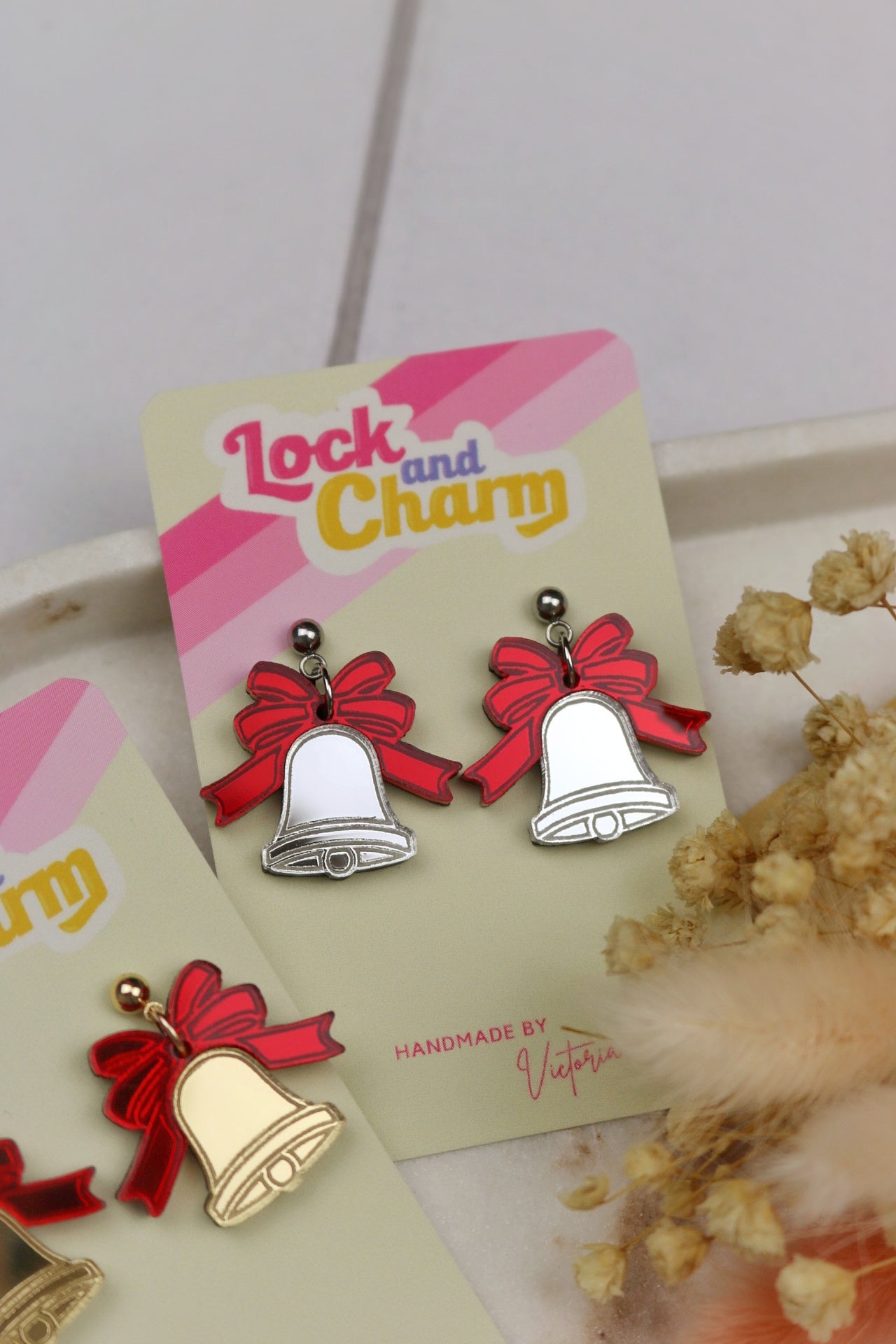 Red Ribbon Bell Acrylic Christmas Earrings